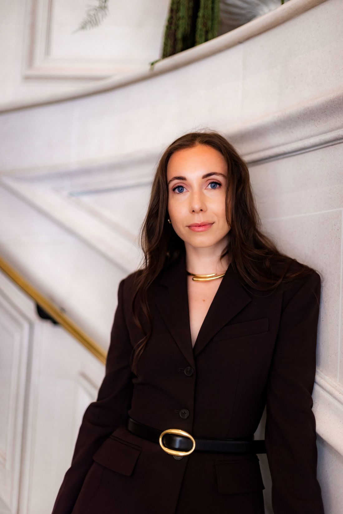 Liv, founder of Keep Up With Liv, in a dark tailored suit
